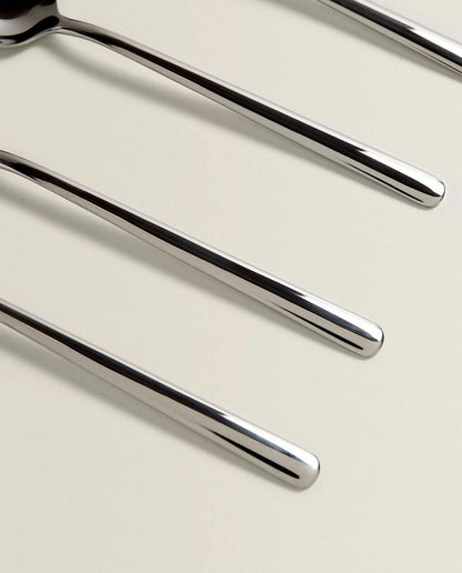 BOX OF 4 SHINY STEEL SPOONS