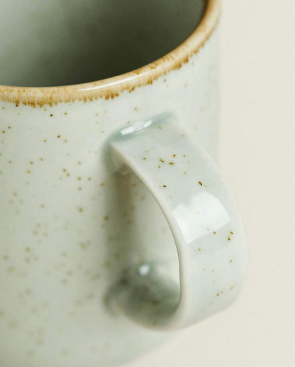 PORCELAIN MUG WITH ANTIQUE FINISH RIM
