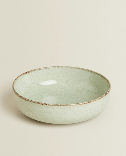 PORCELAIN BOWL WITH ANTIQUE FINISH RIM