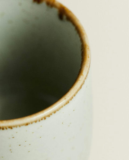 PORCELAIN MUG WITH ANTIQUE FINISH RIM