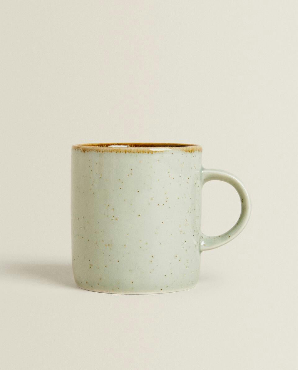 PORCELAIN MUG WITH ANTIQUE FINISH RIM