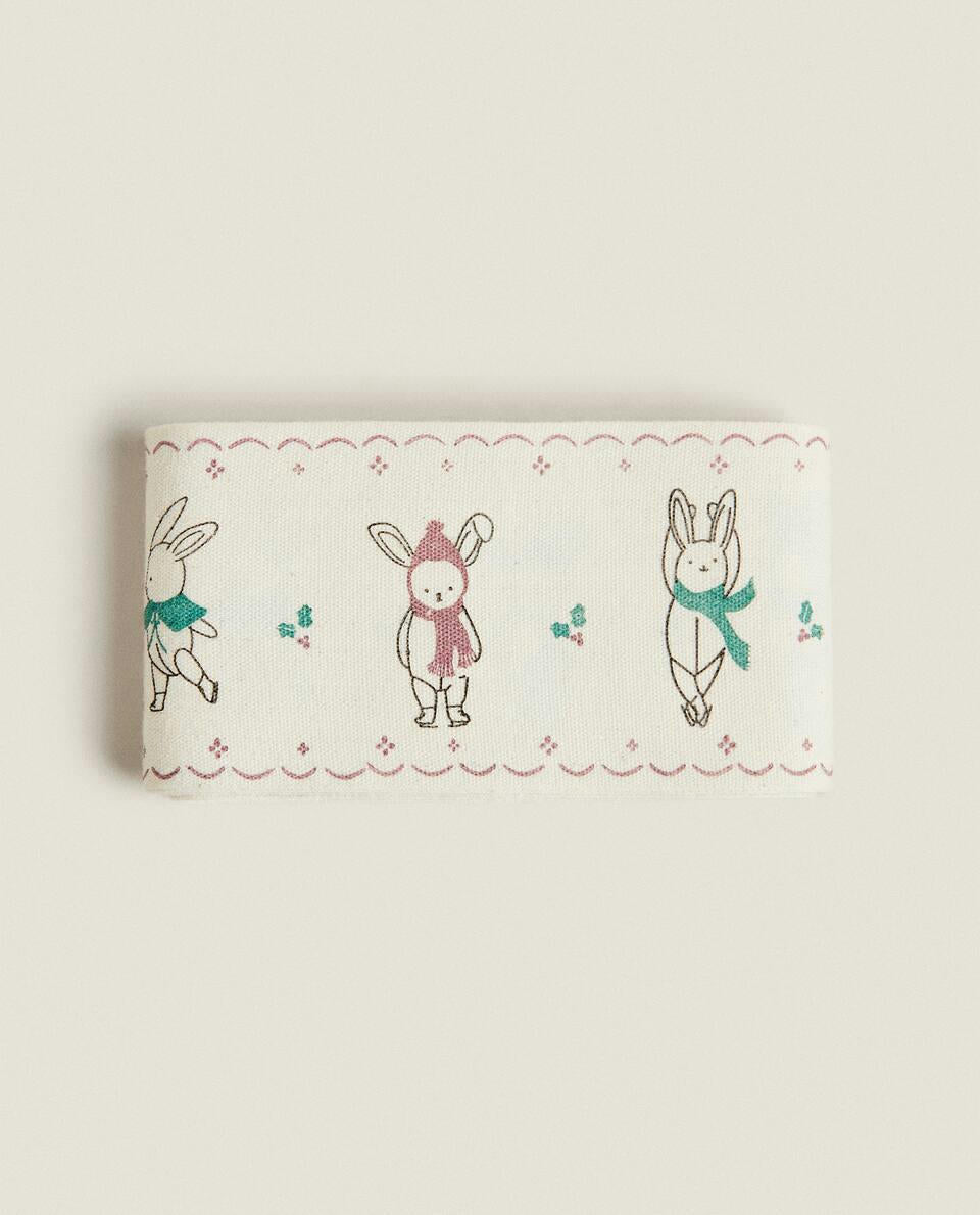 CHILDREN’S WRAPPING PAPER WITH CHRISTMAS BUNNY RABBITS